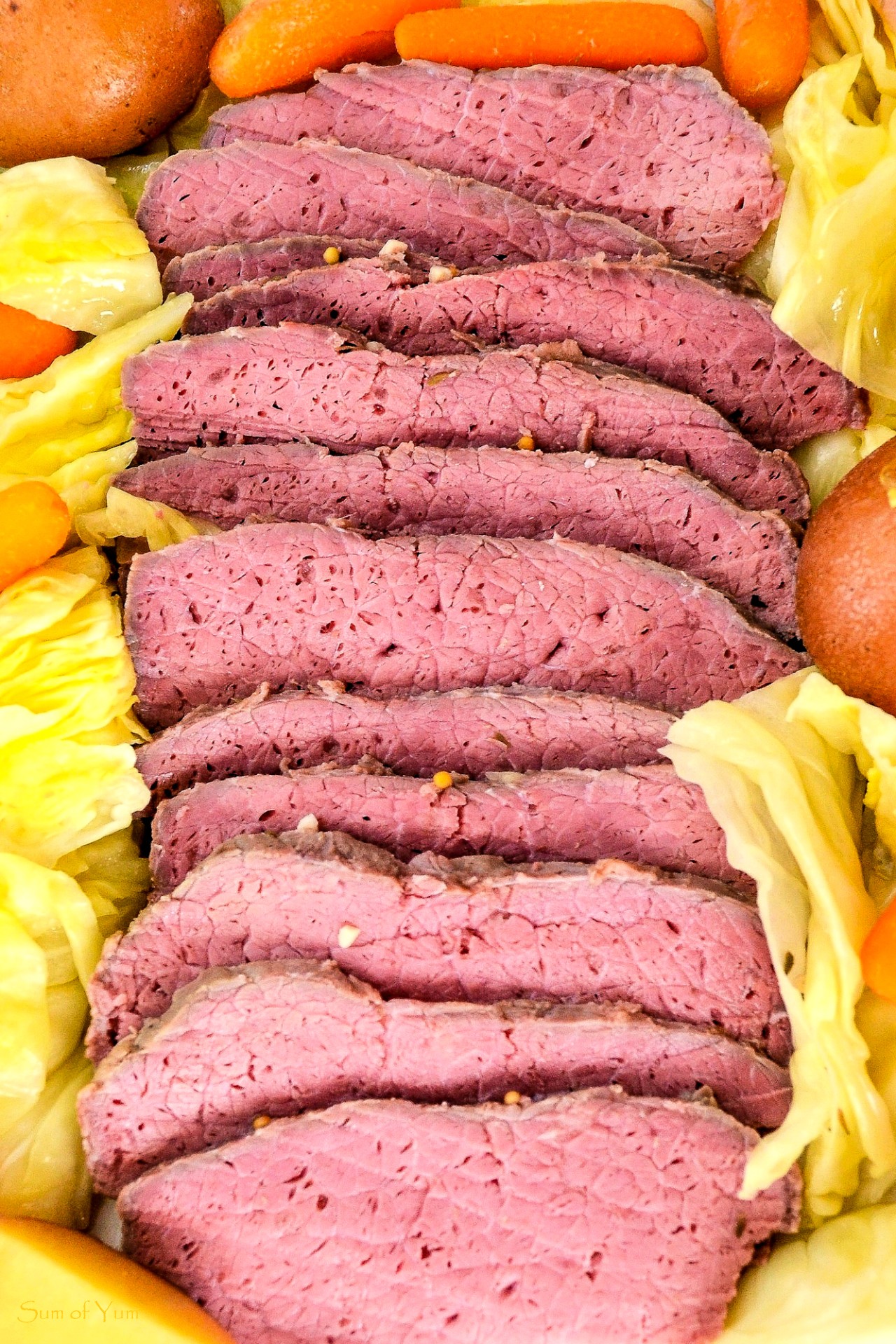 Traditional Irish Corned Beef and Cabbage Recipe - SumofYum.com Traditional Irish Corned Beef and Cabbage Recipe with potatoes and carrots