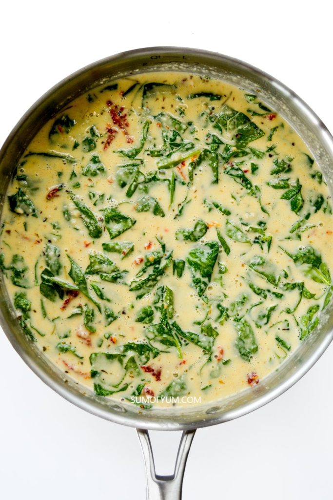 Italian Cream Sauce - A rich garlic parmesan cream sauce with fresh baby spinach and sun-dried tomatoes
