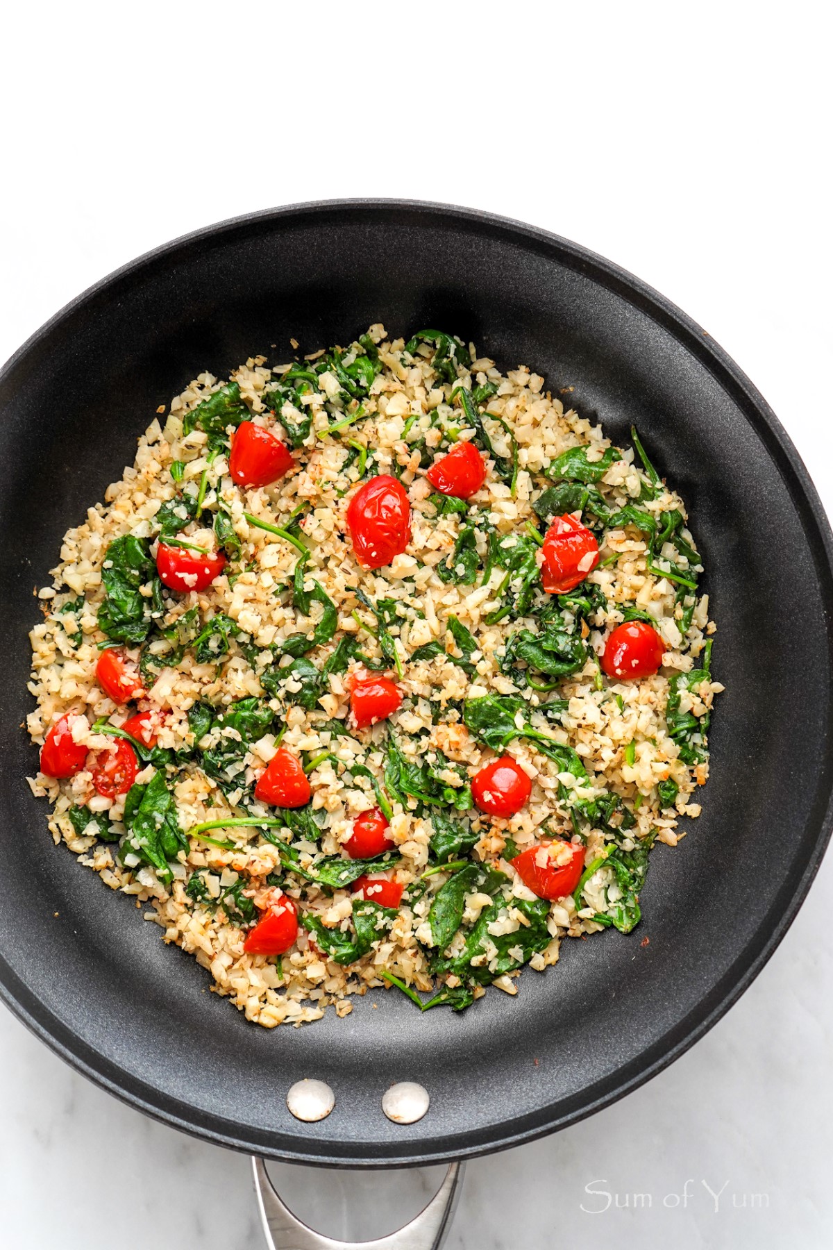 Tuscan Cauliflower Rice with Spinach and Tomatoes