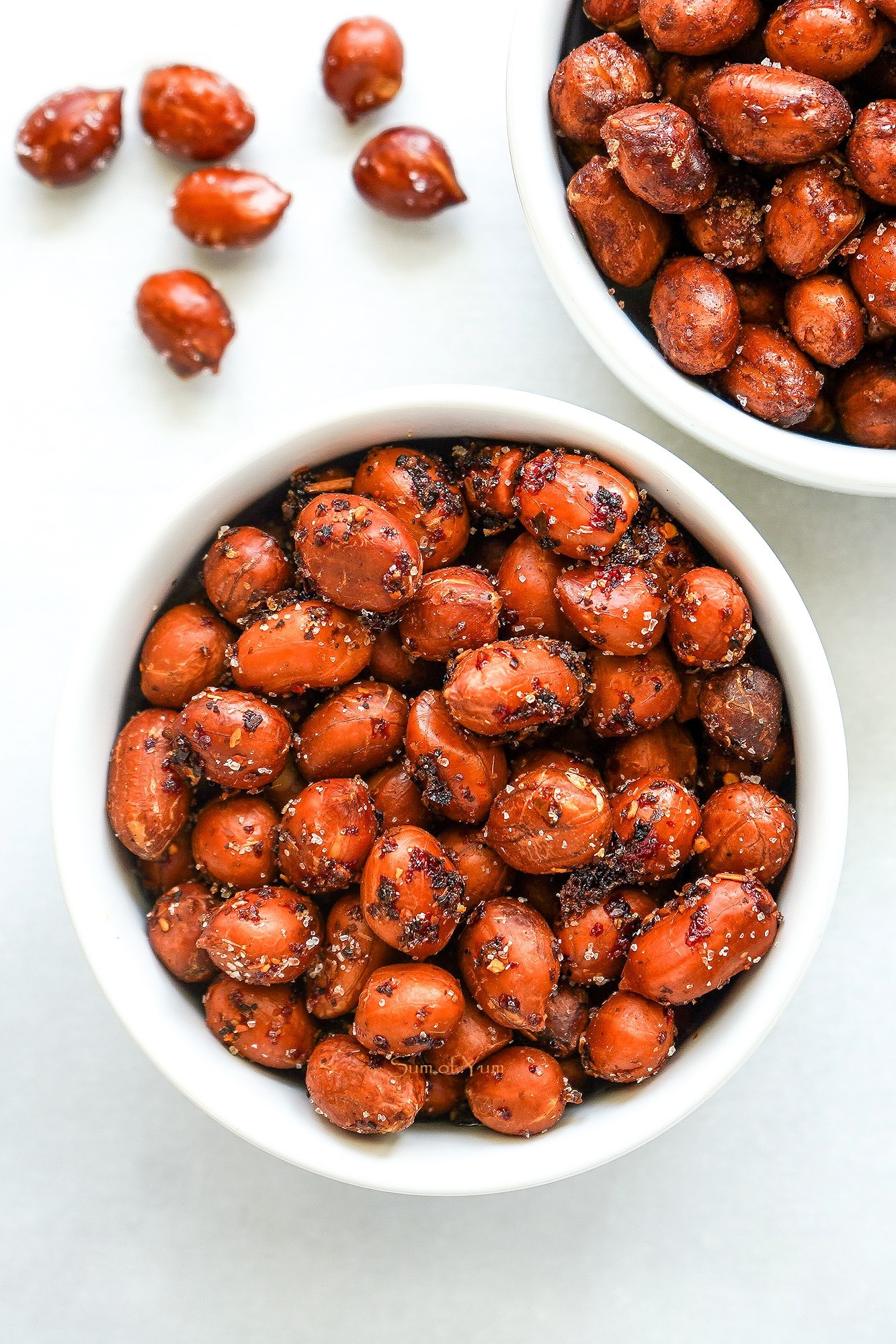 Tajin Chili Lime Peanuts | This spicy peanuts recipe for roasted seasoned peanuts includes spicy Mexican peanuts, Tajin chili lime peanuts, and Cajun peanuts. | SumofYum.com Tajin Chili Lime Peanuts
