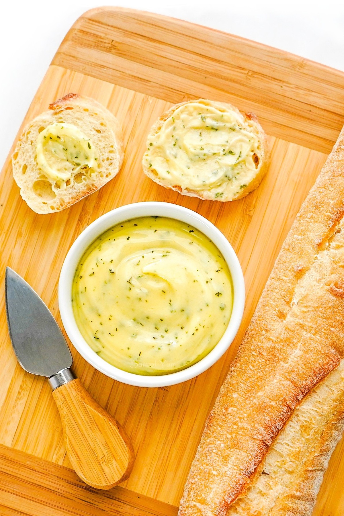Toasted Garlic Bread Recipe Ingredients - SumofYum.com French Bread Baguette with Garlic Herb Butter