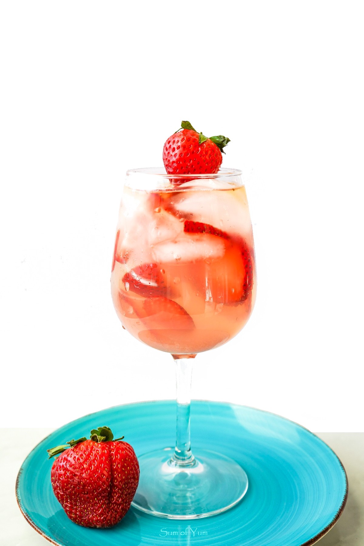 This strawberry white wine spritz recipe is light, refreshing, delicious, and makes the perfect cocktail for brunch, spring, and summer! sumofyum.com strawberry white wine spritz