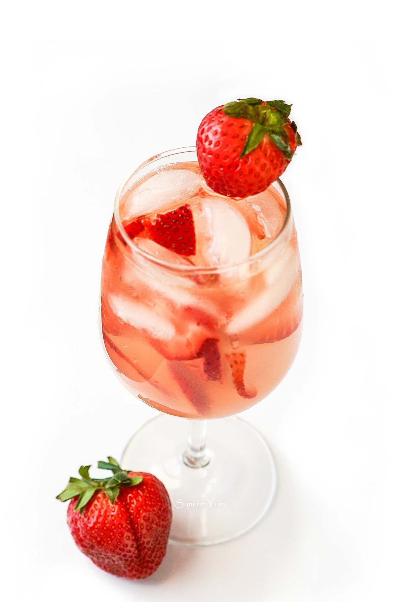 This strawberry white wine spritz recipe is light, refreshing, delicious, and makes the perfect cocktail for brunch, spring, and summer! sumofyum.com Strawberry White Wine Spritz