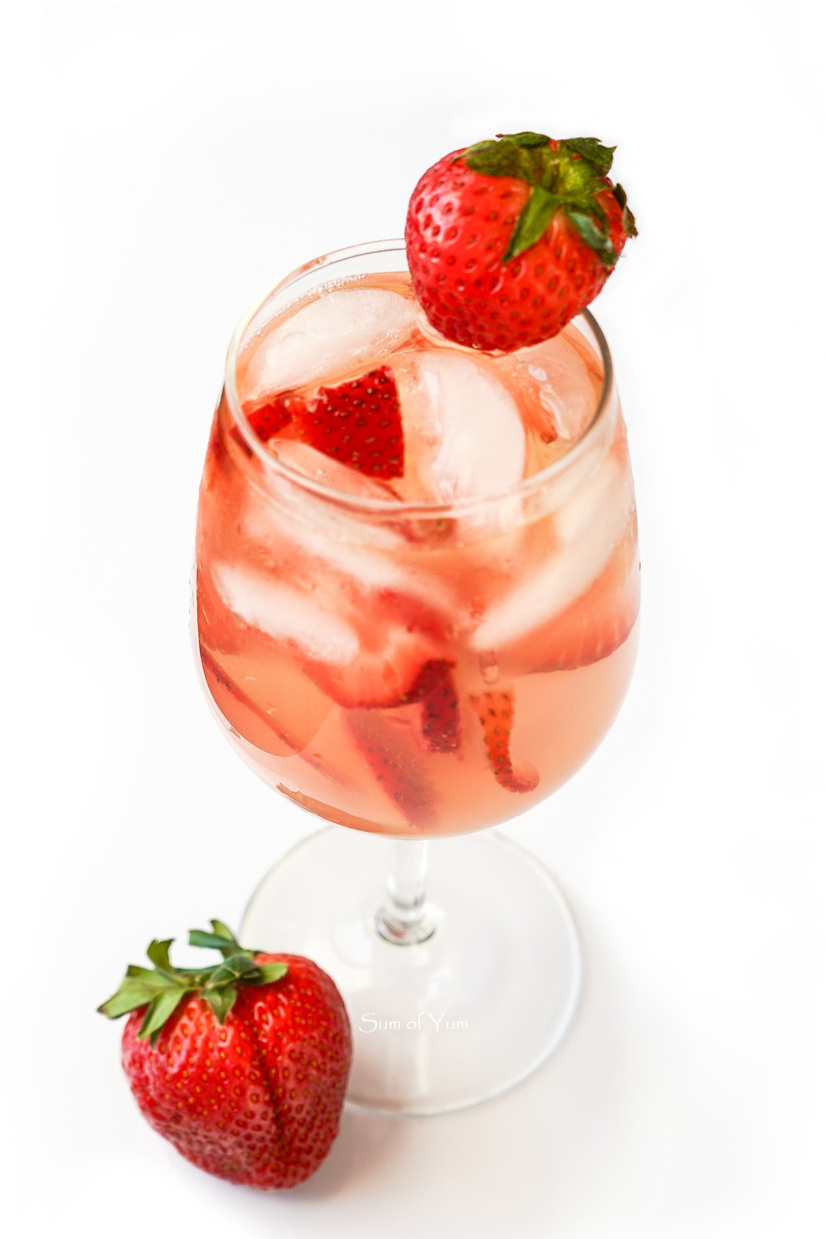 This strawberry white wine spritz recipe is light, refreshing, delicious, and makes the perfect cocktail for brunch, spring, and summer! sumofyum.com Strawberry Spritz