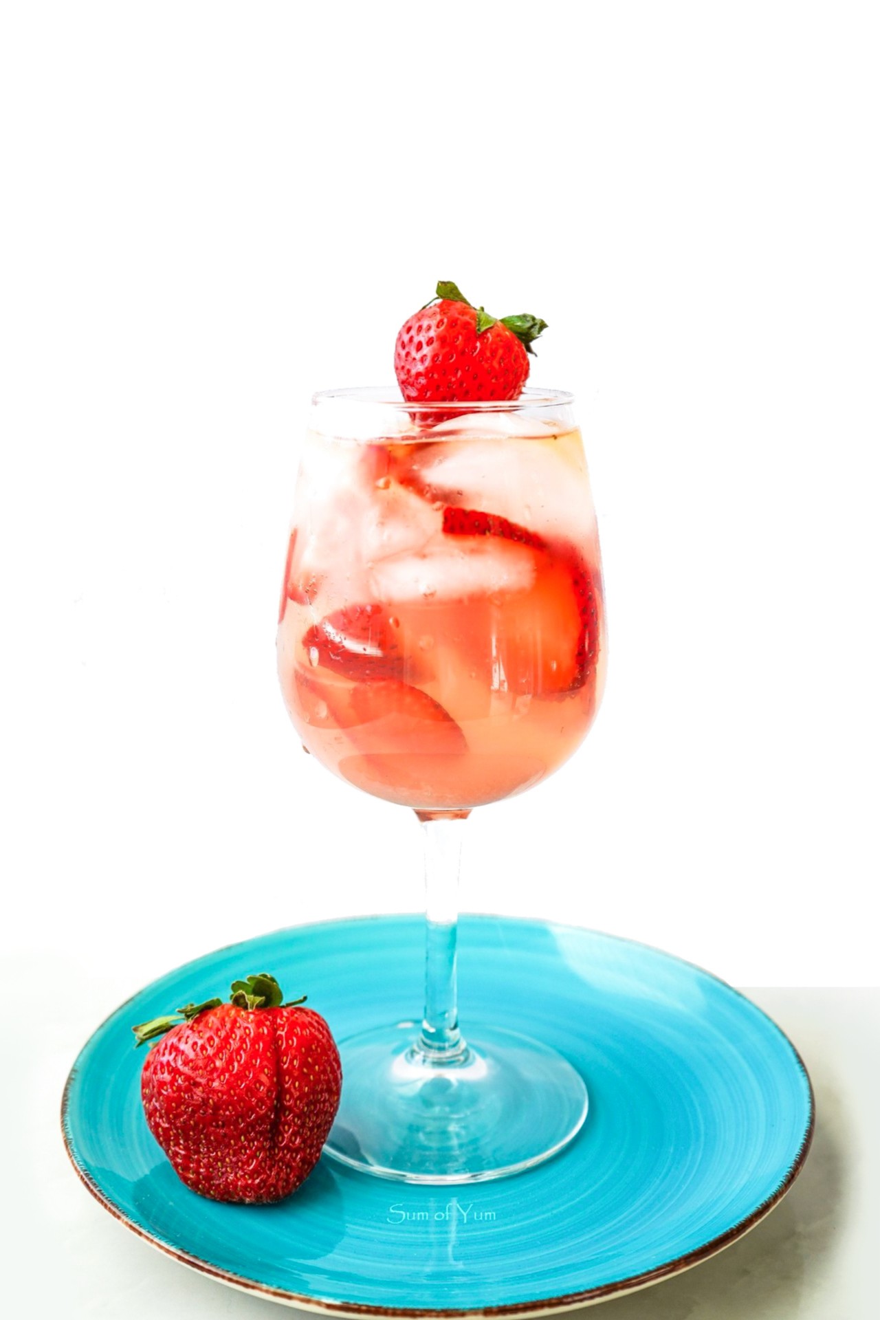 This strawberry white wine spritz recipe is light, refreshing, delicious, and makes the perfect cocktail for brunch, spring, and summer! sumofyum.com White Wine Spritz with Strawberries
