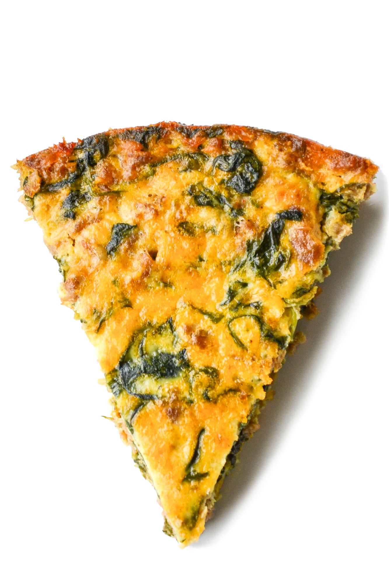 This crustless quiche florentine recipe is a French quiche with spinach, and this low-carb spinach quiche is perfect for brunch or dinner! SumofYum.com Vegetarian French Quiche Florentine (Slice of Spinach Quiche)