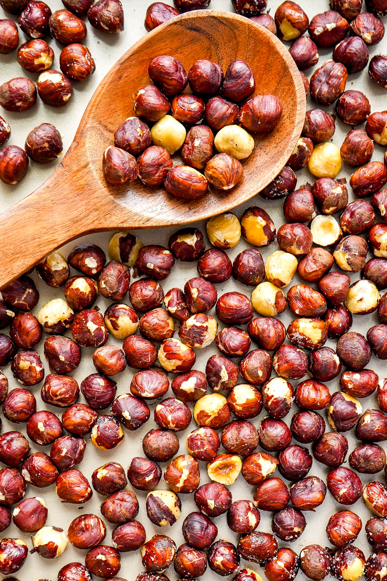 This roasted hazelnut recipe shows how to roast hazelnuts in the oven for dry roasted or salted hazelnuts, aka filberts, that taste amazing! SumofYum.com Oven Roasted Hazelnuts Salted