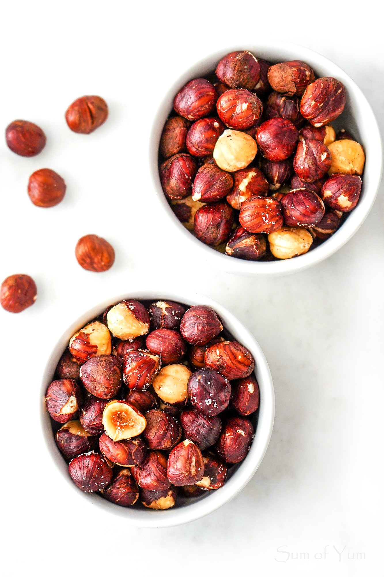 This roasted hazelnut recipe shows how to roast hazelnuts in the oven and make dry-roasted or salted hazelnuts that taste amazing! SumofYum.com salted roasted hazelnuts