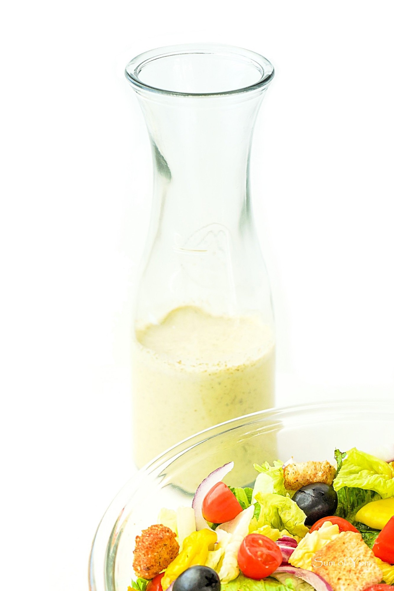 This easy homemade Italian dressing recipe is a Northern Italian dressing that's better than store-bought and delicious on salads and more! SumofYum.com Homemade Creamy Northern Italian Salad Dressing